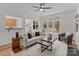 Bright and airy living room with hardwood floors and French doors at 7620 Rolling Meadows Ln, Huntersville, NC 28078