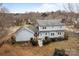 Aerial view of house showcasing backyard and neighborhood at 841 Deerfield Dr, Mount Holly, NC 28120