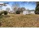 Large backyard with shed and garden space at 841 Deerfield Dr, Mount Holly, NC 28120