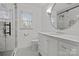 Elegant bathroom featuring a marble shower and modern vanity at 841 Deerfield Dr, Mount Holly, NC 28120