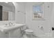 Clean bathroom with pedestal sink and mosaic tile floor at 841 Deerfield Dr, Mount Holly, NC 28120