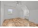 Spacious bedroom with hardwood floors and two windows at 841 Deerfield Dr, Mount Holly, NC 28120