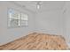 Bright bedroom with hardwood floors and ceiling fan at 841 Deerfield Dr, Mount Holly, NC 28120