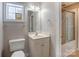 Neat bathroom with vanity, shower/tub combo and tile floor at 8622 Lower Rocky River Rd, Concord, NC 28025