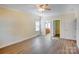 Large bedroom with hardwood floors and en-suite bathroom access at 8622 Lower Rocky River Rd, Concord, NC 28025