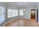 Bright breakfast nook featuring tile flooring and built-in cabinetry at 8622 Lower Rocky River Rd, Concord, NC 28025