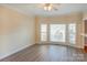 Dining room with bay window and wood-look flooring at 8622 Lower Rocky River Rd, Concord, NC 28025