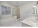 Bathroom with double vanity, jetted tub, and shower at 8804 Ferngrove Ct, Waxhaw, NC 28173