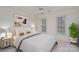 Spacious bedroom with large windows and neutral decor at 8804 Ferngrove Ct, Waxhaw, NC 28173