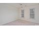 Spacious bedroom with two windows and neutral walls at 8804 Ferngrove Ct, Waxhaw, NC 28173