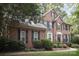 Brick house with black shutters and manicured landscaping at 8804 Ferngrove Ct, Waxhaw, NC 28173