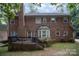 Brick house back view, deck, and yard at 8804 Ferngrove Ct, Waxhaw, NC 28173