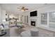 Living room with fireplace, and view into kitchen area at 8804 Ferngrove Ct, Waxhaw, NC 28173