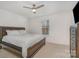 Cozy bedroom featuring a platform bed with crisp white linens and a neutral carpet at 9230 Windygap Rd, Charlotte, NC 28278