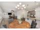 View of the dining area into the living room and kitchen at 9230 Windygap Rd, Charlotte, NC 28278