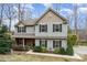 Charming two-story home with appealing curb appeal, landscaping, and exterior design at 9230 Windygap Rd, Charlotte, NC 28278