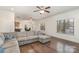 Open concept living room with view into dining room and kitchen at 9230 Windygap Rd, Charlotte, NC 28278