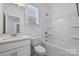 Clean bathroom with a white vanity, bathtub, and toilet at 1182 Lost Cove Rd, Indian Land, SC 29707