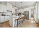 Modern kitchen with stainless steel appliances and white cabinetry at 1182 Lost Cove Rd, Indian Land, SC 29707