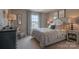 Bright bedroom with a comfortable bed and neutral decor at 12028 Grinstead Ln # 292, Charlotte, NC 28278