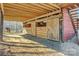 rustic barn with wooden stalls and sliding doors, a horse is visible in the background at 1262 Ring Tail Rd, Claremont, NC 28610