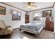 Relaxing bedroom with natural lighting and a ceiling fan at 1262 Ring Tail Rd, Claremont, NC 28610