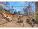 Horse pen features sturdy fencing and a trough, providing a secure and functional space at 1262 Ring Tail Rd, Claremont, NC 28610