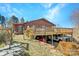 Two-story home with wraparound deck and parking underneath at 1262 Ring Tail Rd, Claremont, NC 28610