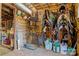 A tack room with saddles, bridles, and other riding equipment neatly organized at 1262 Ring Tail Rd, Claremont, NC 28610