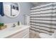 Simple bathroom with shower/tub combo and updated vanity at 127 Halifax Ct, Gastonia, NC 28056