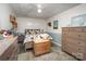 Basement bedroom with a queen bed and ample storage at 127 Halifax Ct, Gastonia, NC 28056