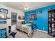 Bright bedroom with a full-size bed and Carolina Panthers decor at 127 Halifax Ct, Gastonia, NC 28056