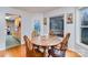 Dining room with wooden table and chairs, kitchen view at 127 Halifax Ct, Gastonia, NC 28056