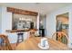 Dining room with wooden table and kitchen view at 127 Halifax Ct, Gastonia, NC 28056