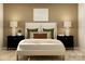 Bedroom with queen-size bed and neutral color palette at 149 Dogwood Grove Pl, Troutman, NC 28166