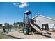 Community playground with slides and climbing structure near pool at 149 Dogwood Grove Pl, Troutman, NC 28166