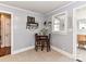 Bright kitchen with a corner table set for two at 1716 Dallas Ave, Charlotte, NC 28205