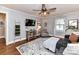 Living room featuring hardwood floors, a sectional sofa, and a TV at 1716 Dallas Ave, Charlotte, NC 28205