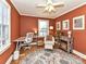 Bright home office features a work desk and comfortable armchair at 1716 Dallas Ave, Charlotte, NC 28205