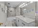 Updated bathroom featuring modern vanity and tiled shower/tub at 1721 Gold Hill Rd, Concord, NC 28025