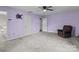 Large bedroom featuring neutral carpet and paint and access to bathroom at 1721 Gold Hill Rd, Concord, NC 28025