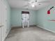 Neutral bedroom with carpet, a ceiling fan, and a window with curtains at 1721 Gold Hill Rd, Concord, NC 28025