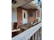 Charming front porch with a wooden bench and wreath near the entry door at 1721 Gold Hill Rd, Concord, NC 28025