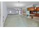 Open living room and kitchen area with plenty of natural light at 1721 Gold Hill Rd, Concord, NC 28025