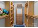 Walk-in closet with custom shelving and ample storage space at 1721 Gold Hill Rd, Concord, NC 28025