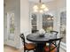 Cozy breakfast nook with large windows offering a view of the backyard at 17521 Cambridge Grove Dr, Huntersville, NC 28078