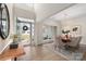 Inviting entryway connects to the dining area, showcasing an open floor plan and natural light at 17521 Cambridge Grove Dr, Huntersville, NC 28078