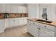 Bright kitchen with granite countertops, white cabinetry, and stainless steel faucet at 17521 Cambridge Grove Dr, Huntersville, NC 28078