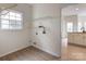 Functional laundry room with natural light and wire shelving at 17521 Cambridge Grove Dr, Huntersville, NC 28078