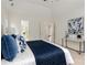 Bright bedroom with a view to an ensuite bathroom at 17521 Cambridge Grove Dr, Huntersville, NC 28078